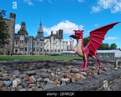 Cardiff, Wales - May 2022: View of Cardiff Castle and the red Welsh Dragon (y Ddraig Goch) Stock Photo