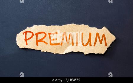 Letter block in word premium on wood background. Stock Photo