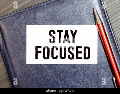 Stay Focused write on Sticky Notes Stock Photo