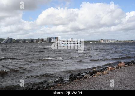 Aquabus travelling on a choppy Cardiff bay, Wales UK Stock Photo