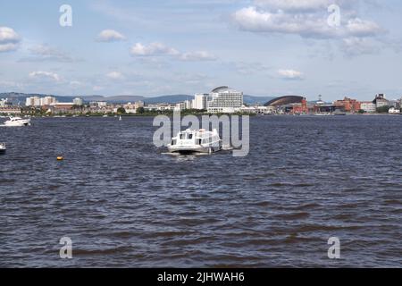 Aquabus travelling on a choppy Cardiff bay, Wales UK, body of water Stock Photo