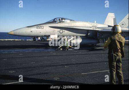 USMC F/A-18 from VMFAT-101 about to take a cat shot Stock Photo