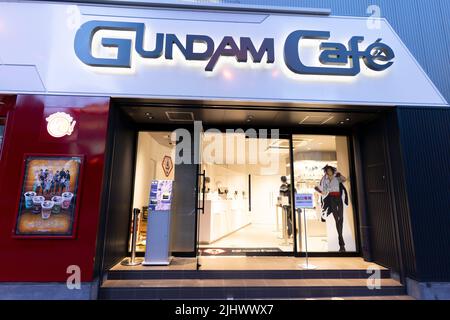 Akihabara, Japan- September 5, 2020: A gundam cafe stands open, during the night, in Akihabara. Stock Photo