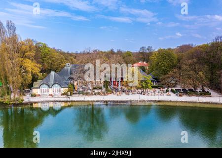 MUNICH, GERMANY, APRIL 28: Corona crisis - lockdown - aerial view of the empty beer garden Seehaus on April 28, 2021 in Munich, Germany. Stock Photo