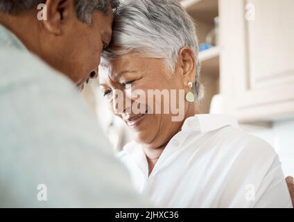 This love is forever. a senior couple spending time together at home. Stock Photo