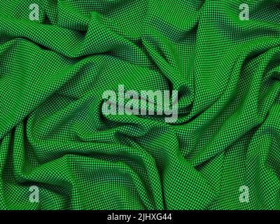 Electric green coarse thread fabric texture with a geometric pattern that forms wrinkles and creates a soft play of light and shadow, especially for t Stock Photo