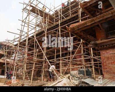 KATHMANDU, NEPAL - CIRCA APRIL 2016- Old King's Palace under reconstruction after the April's 2015 earthquake in the Durbar square in downtown Katmand Stock Photo