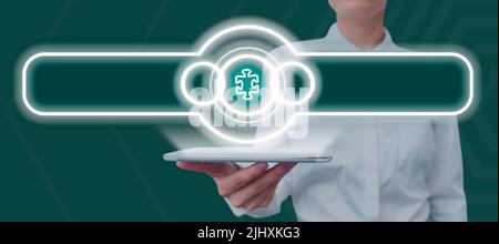 Businesswoman Holding Tablet Presenting Futuristic Display With Jigsaw Piece Symbol Showing Solutions. Woman Holding Pad Presenting Important Stock Photo