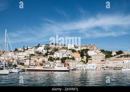 Port of small Mediterranean island town view in clear sunny summer day Stock Photo