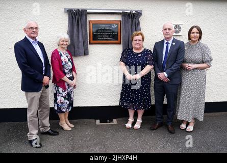 Children of bus driver Jackie Gibson (from left) Robert Gibson, Hilary Magowan, Lynda Van Cuylenburg, Stephen Gibson and Dorothy Crockard, at an event with some of their father's former colleagues in Ulsterbus and current drivers to unveil a plaque at the depot in Ballygowan where he began his journey on Bloody Friday. Jackie was killed in the bomb that detonated at the Oxford Street bus station on July 21 1972. Picture date: Thursday July 21, 2022. Stock Photo