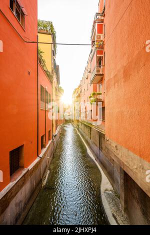Secret window in the wall to the hidden part of the city in Bologna, Italy. Canal of Reno in Piella street. High quality photo Stock Photo