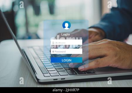 man using keyboard computer laptop login interface on touch screen. user name and password inputs on virtual digital account online. Stock Photo