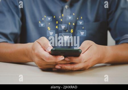 Businessman using smart phone shopping online virtual screen. Stock Photo