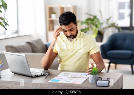 ui designer working on user interface at home Stock Photo