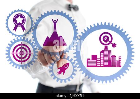 Goals concept shown by a man in background Stock Photo