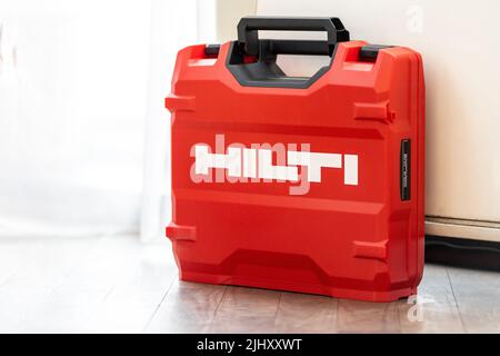 Hilti new red tool case on the floor Stock Photo