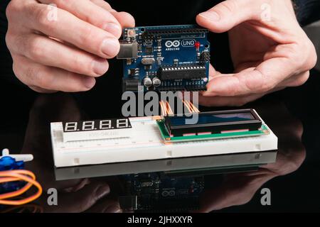 Arduino UNO board with electronic components Stock Photo