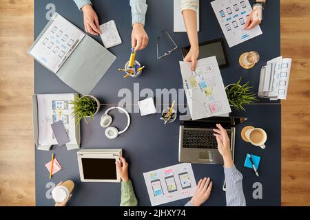 business team with gadgets working at office table Stock Photo