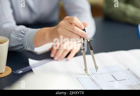 architect with blueprint and drafting compass Stock Photo