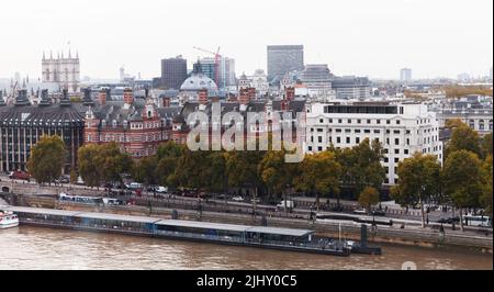 Aerial cityscape of London, Victoria Embankment view with Westminster Millennium Pier and  New Scotland Yard Building