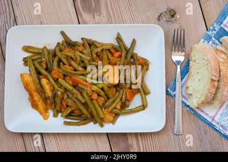 Greek Cuisine . Green Beans in Olive Oil, in Greece fasolakia ladera Stock Photo