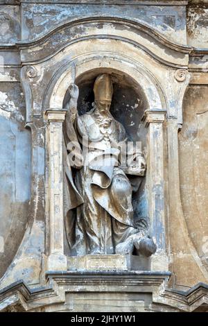 Statue on the facade of the church of Sant'Agostino, Città Sant'Angelo, Italy Stock Photo