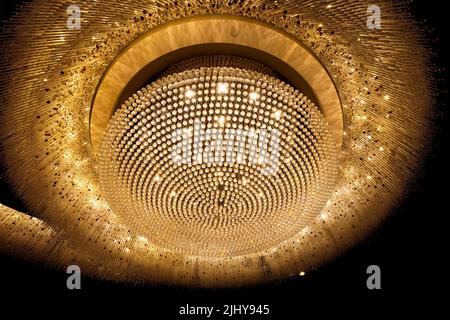 Crystal chandelier with yellow light Stock Photo