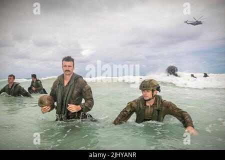 Waimanalo, United States. 18 July, 2022. Australian Army soldiers, assigned to 2nd Battalion, Royal Australian Regiment, swim to shore after conducting helocasting and amphibious operations, during the Rim of the Pacific exercises at Bellows Beach July 18, 2022 in Bellows Air Force Station, Hawaii. Credit: Cpl. Dillon Anderson/U.S. Navy/Alamy Live News Stock Photo