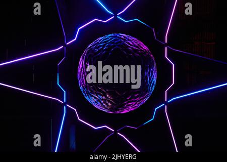 Abstract floating brain with neon lights and star pattern Stock Photo