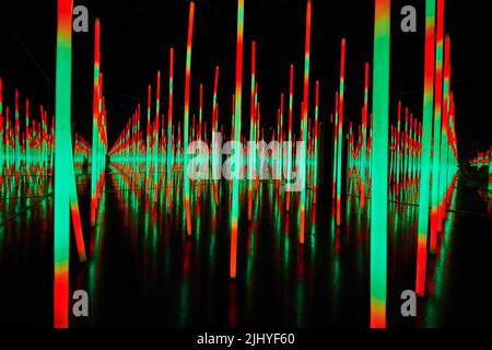 Green and red LED lights in infinity mirror room Stock Photo