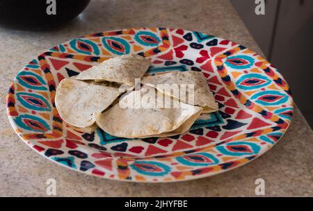 Mexican quesadillas on a dish. Mexican food. Stock Photo