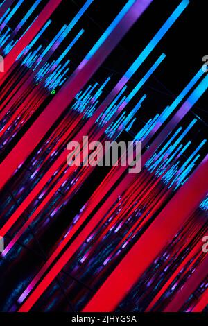 Angled and abstract LED neon lights in blue and red Stock Photo