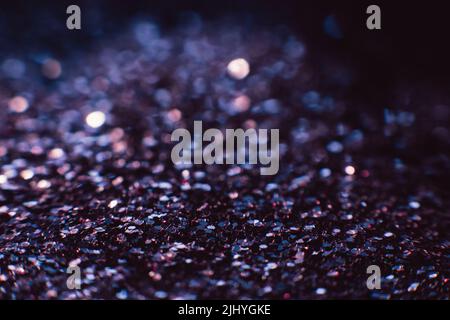 Abstract shining glitters purple makeup background Stock Photo