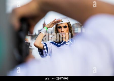 Berlin, Germany. 21st July, 2022. Amy Strong has her picture taken on the banks of the Spree River before the start of a Christopher Street Day (CSD) event. Credit: Christoph Soeder/dpa/Alamy Live News Stock Photo