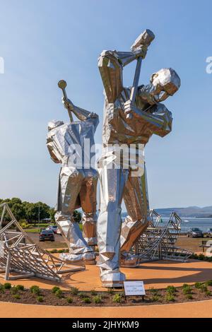 Stainless steel art sculptures called 'Shipbuilders of Port Glasgow' by John McKenna in Coronation Park, Port Glasgow depicting workmen Stock Photo