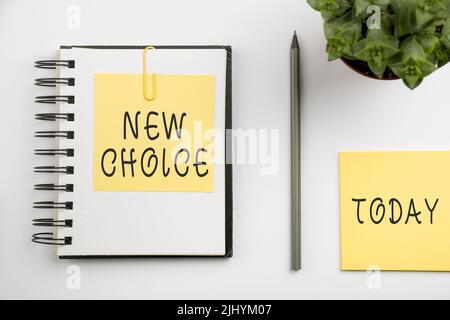 A vector of hand writing sign 'New Choice' on notebook with 'today' sign in white background Stock Photo