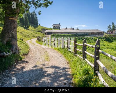 The mountain hut - Malga Romeno, at the feet of the Mount Roen, italian dolomites - Trentino Alto Adige, northern italy - Stock Photo