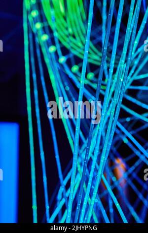 Neon light sticks in spiral pattern Stock Photo