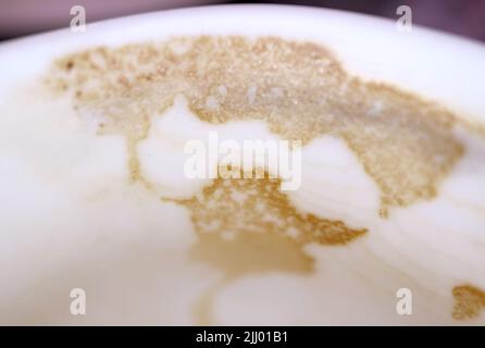 Closeup of coffee traces on a cup after finished drinking Stock Photo