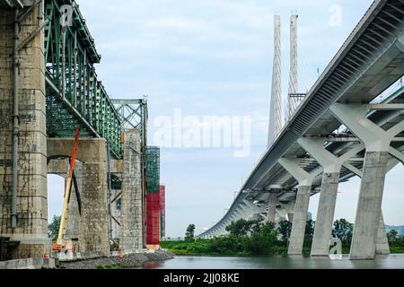 Old and new. The decommissioned Champlain Bridge stands juxtaposed to its successor. Stock Photo