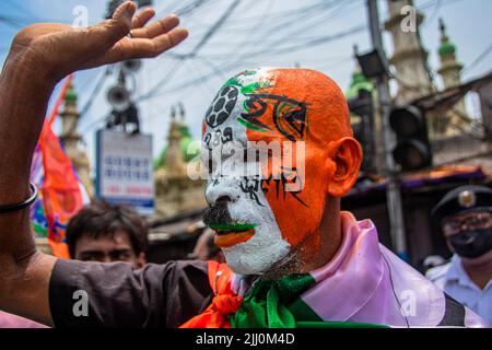 Kolkata, West Bengal, India. 21st July, 2022. An attendee with face painted in national colors during the 21 July Martyr's Day Rally organized by the Trinamool Congress to commemorate the 1993 Kolkata firing as Martyrs' Day. 13 were people shot by Kolkata Police, during a rally by the West Bengal Youth Congress under Mamata Banerjee's leadership on 21 July 1993, while demanding Voter's Identity Card to be made sole required document for voting. (Credit Image: © Sudip Chanda/Pacific Press via ZUMA Press Wire) Stock Photo
