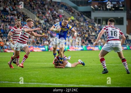 Harry Newman #3 of Leeds Rhinos breaks away to score a try during the ...