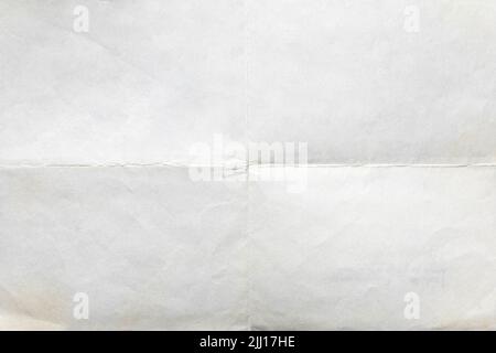 Old letter paper folded in four, texture background Stock Photo