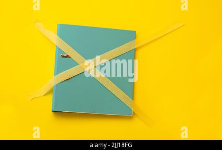 Folder sticked up with masking tape Stock Photo