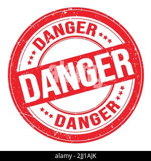 DANGER text written on red round grungy stamp sign Stock Photo