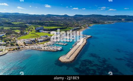 Aerial bird's eye view of Latchi port, Akamas peninsula, Polis Chrysochous, Paphos, Cyprus. The Latsi harbour with boats and yachts, fish restaurants, Stock Photo