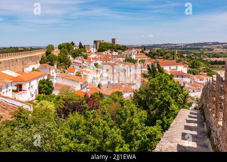 The castle fortress of Obidos with a completely preserved and accessible city wall and the Castelo de Obidos, Portugal Stock Photo