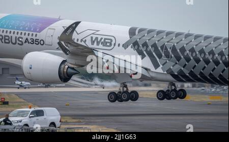 Farnborough International Airshow, 18 July 2022, Hampshire, England, UK. Airbus A350 X WB F-WWCF touches down on the runway after a demonstration flight at the Trade Airshow. Stock Photo