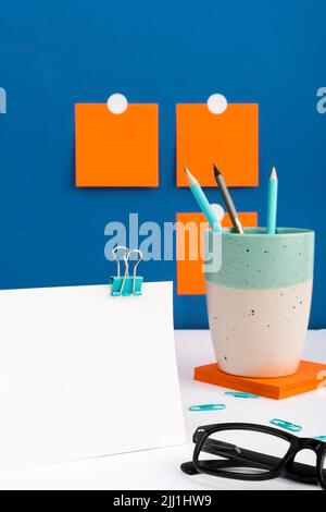 Important Message Written On Piece Of Paper On Desk With Cup With Pencils, Notes, Clips And Glasses. Crutial Informations Presented On Notepad On Stock Photo