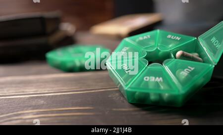 Containers full of pills, capsules and dietary supplements. Healthy lifestyle, medicine, pharmaceutical, regimen, useful vitamins concept Stock Photo